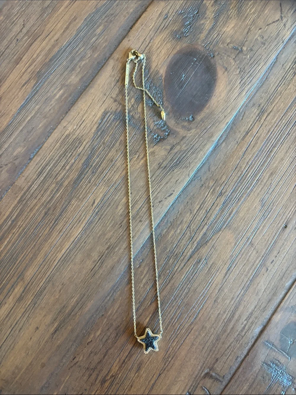 Kendra Scott Gold Star Necklace with Black Center